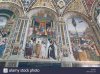 italy-siena-december-26-2016-the-view-of-the-frescoes-describes-canonization-K9DH9F.jpg
